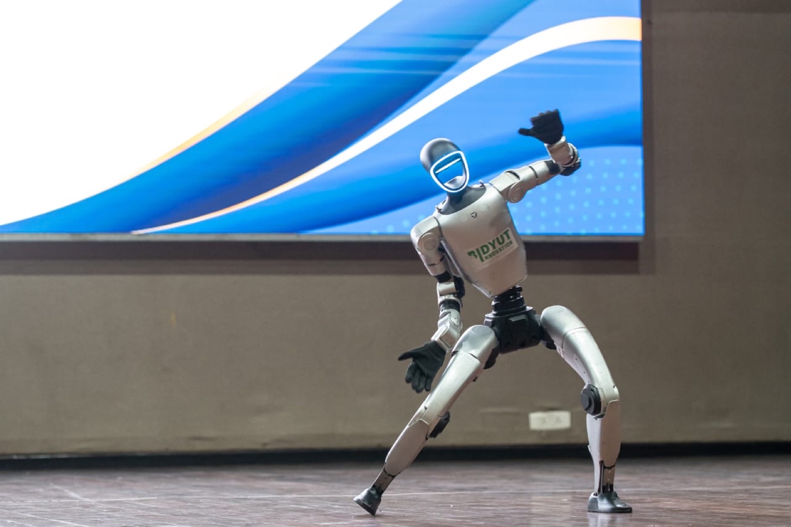 A humanoid robot arm at work in a laboratory.
